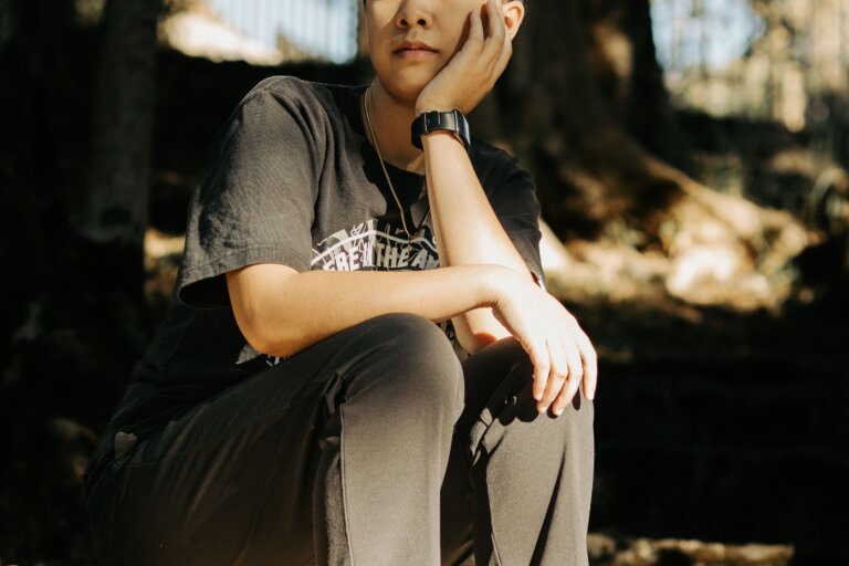 Person in a thoughtful and reflective pose
