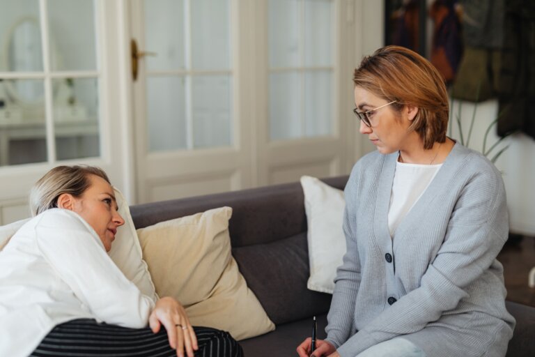 Person reclining comfortably in a peaceful and calming therapy setting
