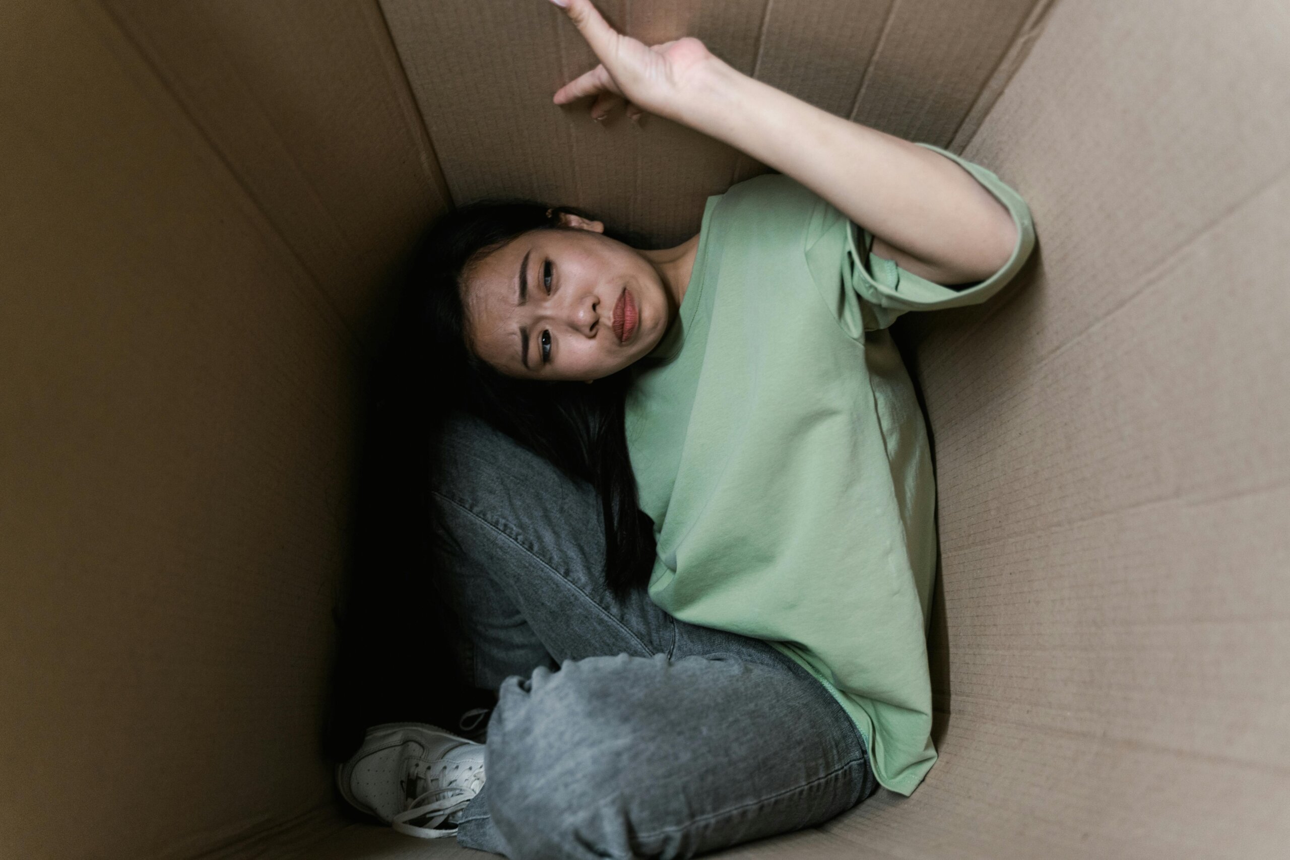 Person inside a box symbolizing fear and feeling trapped