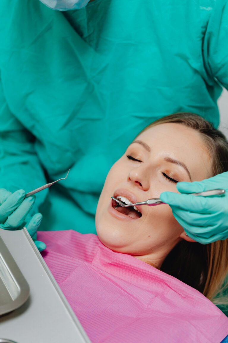 Calm dental patient sitting in the dentist chair, feeling relaxed and at ease during treatment