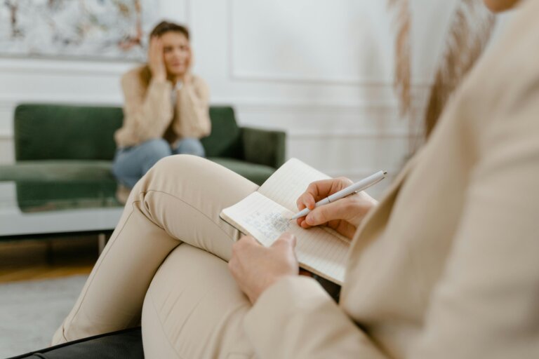 Person in a private therapy session, receiving one-on-one counseling, Blushing