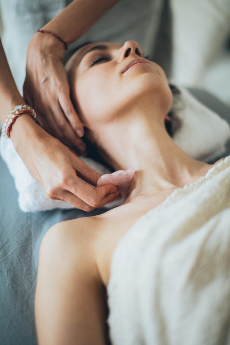 Woman receiving a relaxing massage to relieve stress and promote wellness