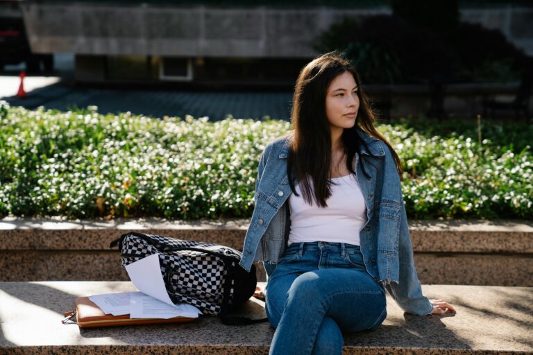 Student sitting relaxed at a desk in a calm and comfortable study environment